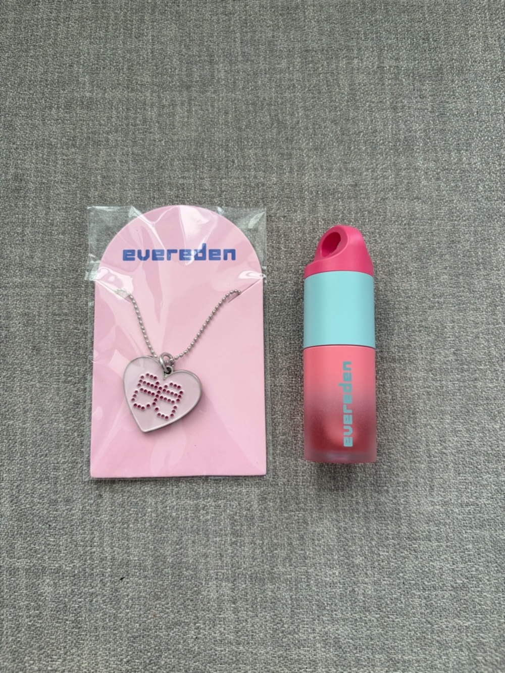 Evereden lip gloss and necklace